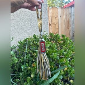 MCM Gold and Red Tassel Keychain